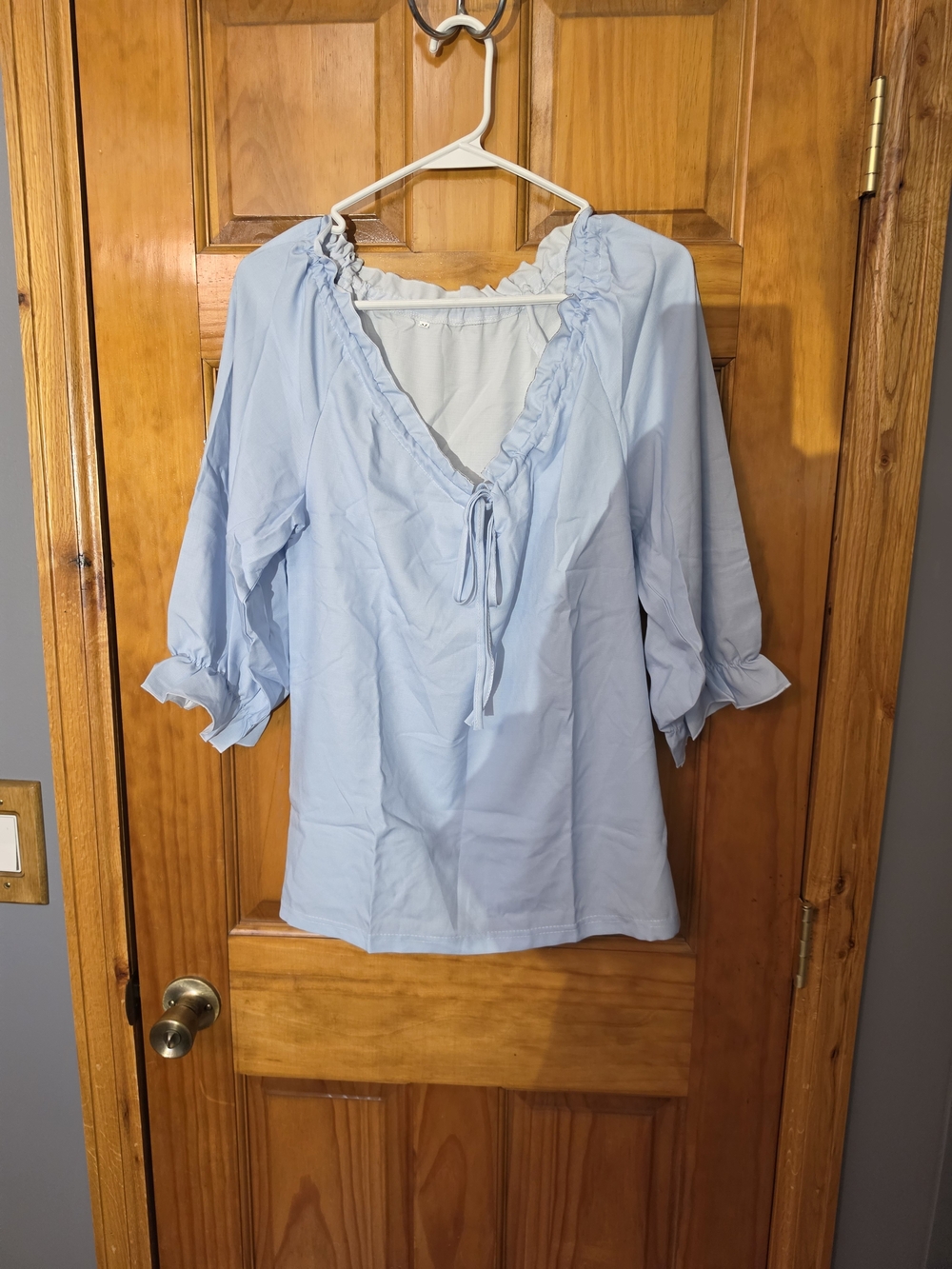 Light Blue Ruffled V-Neck Women’s Top